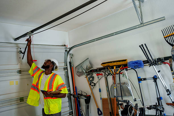 Professional Garage Door Panel Replacement technician working in Warrenton, OR